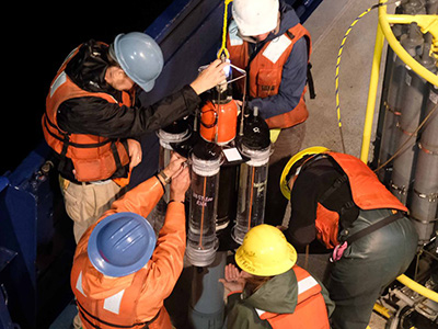 Researchers bring an NBST onto the deck of the R/V <em>Roger Revelle</em>. Credit: NASA