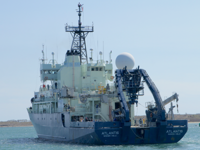 R/V <em>Atlantis</em> steams away from Woods Hole for a seasonal phytoplankton bloom in the North Atlantic. Credit: Michael Starobin (NASA)