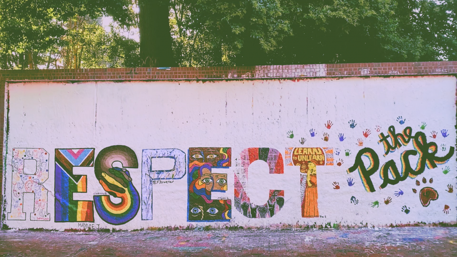 The words "RESPECT the Pack" painted at the entrance to NC State's Free Expression Tunnel.