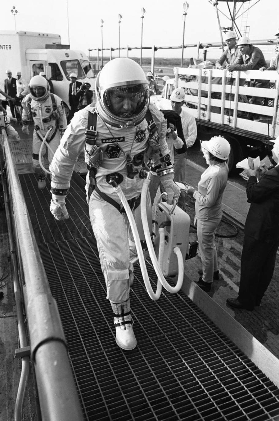 Gemini VI command pilot Wally Schirra and pilot Thomas Stafford arrive at Pad 19.