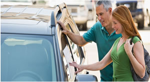 Woman shopping for new car