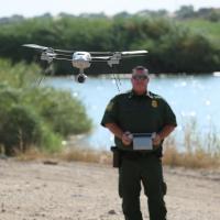 Border Patrol agent flying small drone