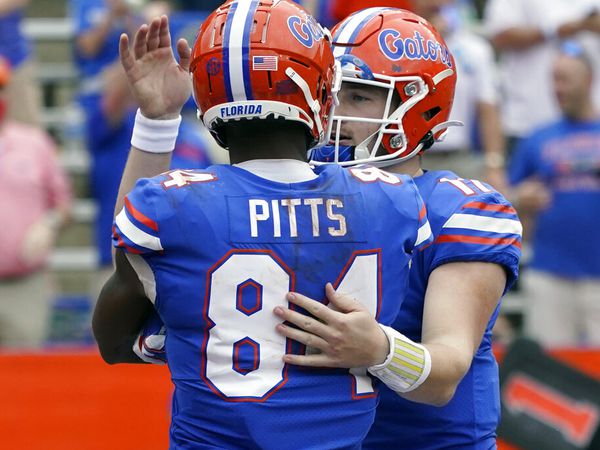 Florida tight end Kyle Pitts, a 6-6 junior, presents a matchup nightmare for Alabama's defense in Saturday's league title game. His quarterback, Kyle Trask, right, leads the nation in touchdown passes with 40 and passing yardage with over 3,700,