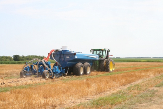 Tractor applying liquid manure to a farm field. Photo from NRCS.