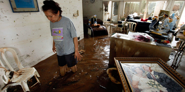 Woman in flood water