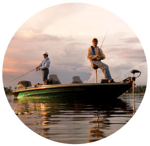 photo of a two men fishing on a boat