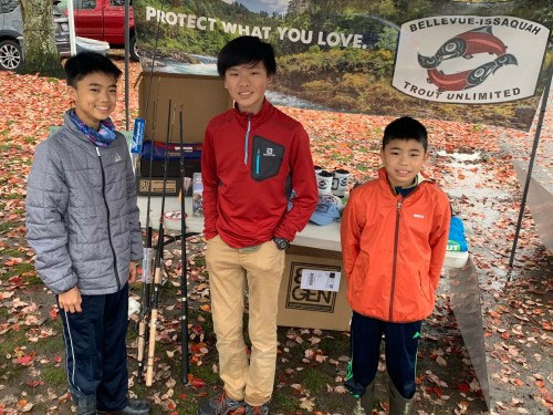 photo of children standing in front of a prize table