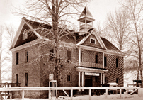 The "schoolhouse lab" where Spencer and Parker produced the first effective vaccine against spotted fever. Extensively renovated over the years, this building has served as a museum and is currently the Hamilton Playhouse on Ricketts Road.