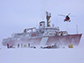 crew members deploy equipment onto the ice from a Canadian icebreaker