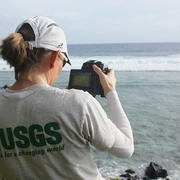 USGS scientist collects thermal images with camera next to a lagoon in US Samoa      