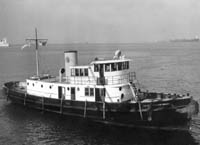 PHS cutter ship transporting quarantine inspectors to board ships flying the yellow quarantine flag.