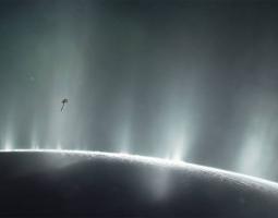 This illustration shows NASA's Cassini spacecraft flying through plumes on Enceladus in October 2015.