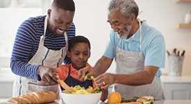 family cooking a meal