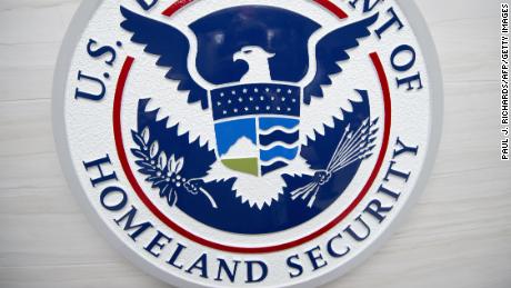 The Department of Homeland Security logo is seen at the new ICE Cyber Crimes Center expanded facilities in Fairfax, Virginia July 22, 2015. The forensic lab combats cybercrime cases involving underground online marketplaces, child exploitation, intellectual property theft and other computer and online crimes.  AFP HOTO/Paul J. Richards        (Photo credit should read PAUL J. RICHARDS/AFP/Getty Images)