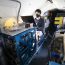 Masks are part of the safety protocol for ACTIVATE scientists. Here, Yonghoon Choi prepares for a science flight on the HU-25 Falcon. Credits: NASA/David C. Bowman