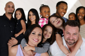 group of multicultural families smiling