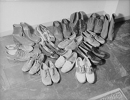 This is the Herbster shoe supply. A new pair of shoes a month is needed by the family. ... Photo by Office of Emergency Management, 1941. Prints & Photographs Division