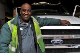 Man in front of truck