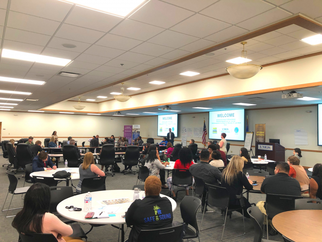 group in conference room at housing summit