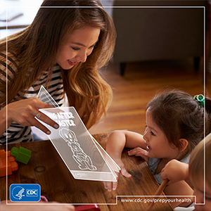 Mother reading to daughter 