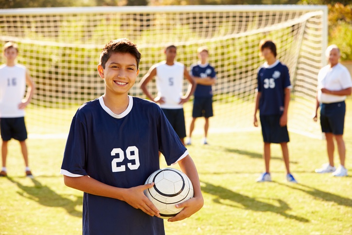 Teens ready to play a volleyball game