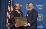 Deputy Secretary D. Brouilette presents Dr. Alveda Knight an Appreciation Award at the Special Observance - MLK Day program, January 25, 2018