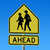 Street sign warning of children crossing the road