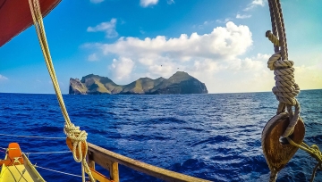 The island of Nihoa in Hawaii's Papahānaumokuākea Marine National Monument as seen from aboard a Polynesian canoe. Photo: Office of Hawaiian Affairs.