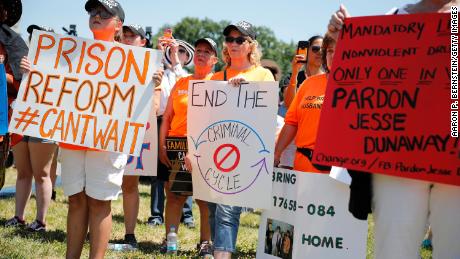 WASHINGTON, DC - July 10: Protesters hold signs during a rally calling for criminal justice reform outside the U.S. Capitol July 10, 2018 in Washington, DC. Demonstrators and members are calling for the passage of the First Steps Act. (Photo by Aaron P. Bernstein/Getty Images)