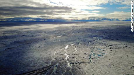 Greenland&#39;s ice sheet is the single biggest contributor to global sea level rise and recent studies show it&#39;s melting faster than expected. Here, on the ice sheet&#39;s southwestern side (pictured in summer 2017), water generated by melting ice carves rivers into the surface. 