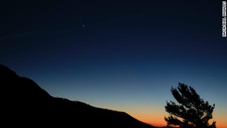 Saturn, top, and Jupiter, below, are seen after sunset from Shenandoah National Park, Sunday, Dec. 13, 2020, in Luray, Virginia. 