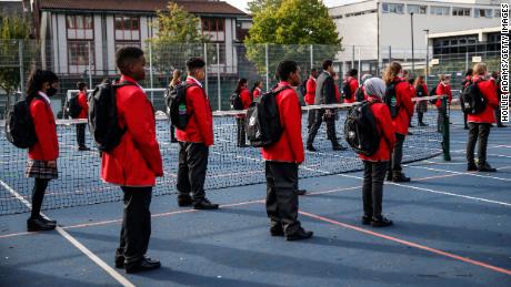 LONDON, ENGLAND - SEPTEMBER 04: Year 7 students practice social distancing measures at City of London Academy Highgate Hill on September 4, 2020 in London, England. A limited number of students returned to the school today as it began a phased reopening after the height of the coronavirus pandemic. The full student body will return on September 14th. (Photo by Hollie Adams/Getty Images)