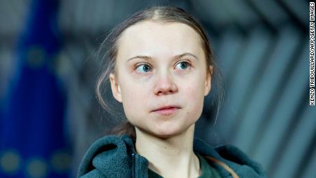 Swedish environmentalist Greta Thunberg arrives for a meeting with EU environment ministers at the Europa Building in Brussels on March 5, 2020. - Europe unveiled a landmark green growth law on March 4, 2020, but failed to the impress 17-year-old Swedish eco-warrior Thunberg, who dubbed it a &quot;surrender&quot; to the threat of climate change. The European Commission&#39;s draft of the law mandates EU members to achieve &quot;climate neutrality&quot; -- net zero greenhouse emissions -- by 2050. (Photo by Kenzo TRIBOUILLARD / AFP) (Photo by KENZO TRIBOUILLARD/AFP via Getty Images)