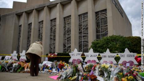 PITTSBURGH, PA - OCTOBER 31:  Mourners visit the memorial outside the Tree of Life Synagogue on October 31, 2018 in Pittsburgh, Pennsylvania. Eleven people were killed in a mass shooting at the Tree of Life Congregation in Pittsburgh&#39;s Squirrel Hill neighborhood on October 27. (Photo by Jeff Swensen/Getty Images)