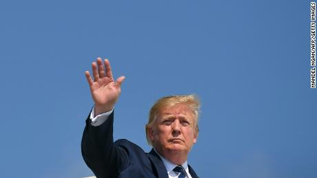 US President Donald Trump makes his way to board Air Force One before departing from Morristown Municipal Airport in Morristown, New Jersey on July 21, 2019. - Trump is returning to Washington after spending the weekend at his Bedminster, New Jersey golf resort. (Photo by MANDEL NGAN / AFP)        (Photo credit should read MANDEL NGAN/AFP via Getty Images)