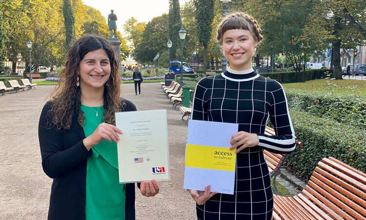 Deputy Public Affairs Officer Nazanin Berarpour congratulates Annika Tuominen, the American Studies Grant 2019 winner. (© State Department)