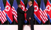 President Donald J. Trump and North Korean leader Kim Jong Un, shake hands as they meet for the first time, June 12, 2018, at the Capella Hotel in Singapore.