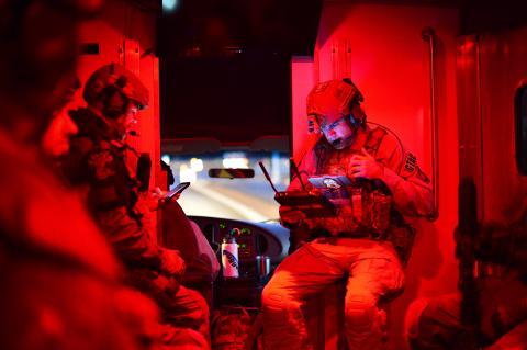 An AMO Ground Team Air Coordinator (GTAC) preparing for the execution of numerous search and arrest warrants in southern Arizona that dismantled a local drug trafficking organization suspected of distributing and selling heroin, marijuana, and various firearms.