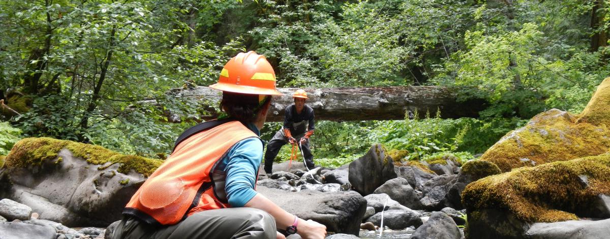 Two BLM employees conduct stream monitoring, BLM photo