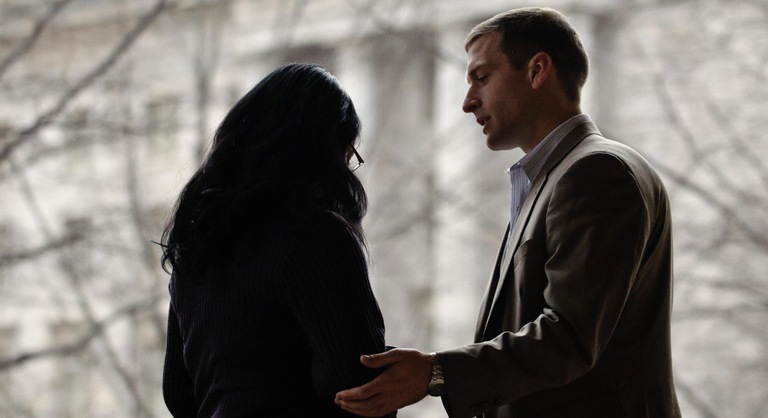 Victim being consoled at FBI Headquarters.