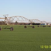 photo of an irrigation rig in a sod field 