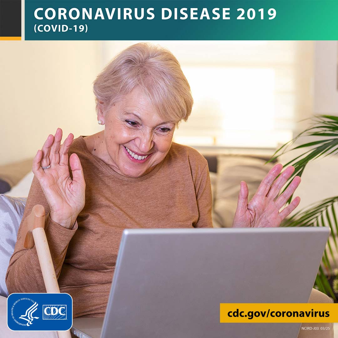 a happy woman on a laptop with the text CORONAVIRUS DISEASE 2019 (COVID-19), site URL, and CDC logo."  Photo of a happy woman on a laptop with the text CORONAVIRUS DISEASE 2019 (COVID-19), site URL, and CDC logo.