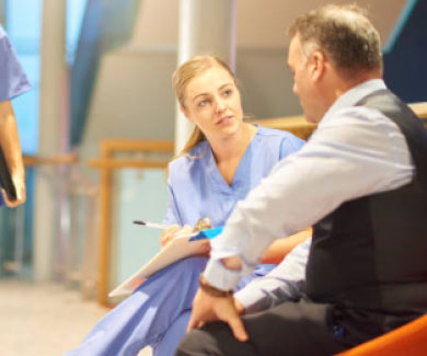 Nurse speaking with patient