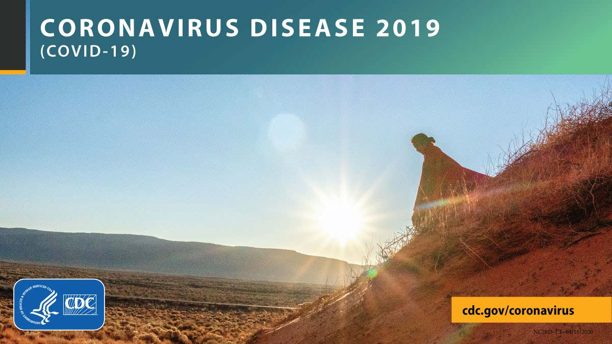 A person walking down a hill in front of sunrise with the text CORONAVIRUS DISEASE 2019 (COVID-19), cdc.gov/covid19, and CDC logo