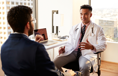 Man talking with a doctor