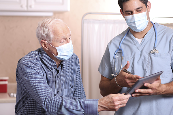 health care professional speaking with patient